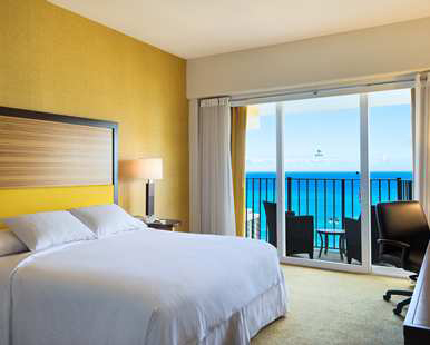 Our One King Bed Deluxe Ocean View Room